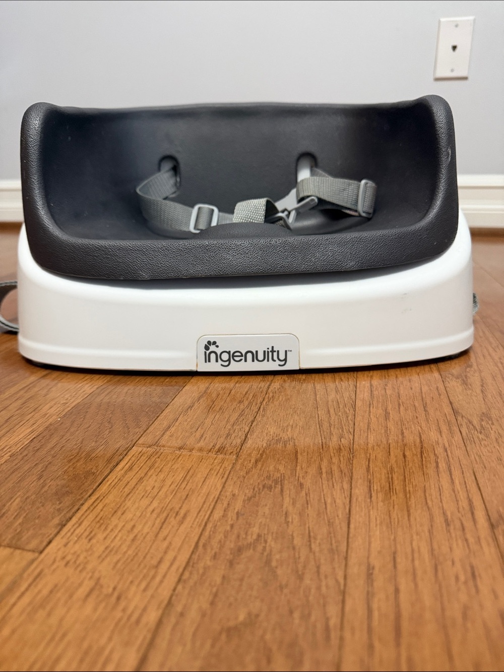 Gray and White Elevated Booster Seat with Safety Strap